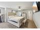 Spacious main bedroom featuring a plush bed, soft carpet, and plenty of natural light at 3464 Enterkin Ln, Atlanta, GA 30349