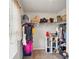 Neat walk-in closet with shelving, hanging rods, and organization, providing storage for clothing and accessories at 3464 Enterkin Ln, Atlanta, GA 30349