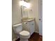 The bathroom features a granite countertop and white cabinets at 988 Old Holcomb Bridge Rd, Roswell, GA 30076