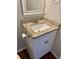 The bathroom vanity features a granite countertop and a white undermount sink at 988 Old Holcomb Bridge Rd, Roswell, GA 30076