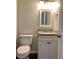 The bathroom features a granite countertop and toilet at 988 Old Holcomb Bridge Rd, Roswell, GA 30076