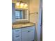 Bathroom vanity with granite countertops, white cabinets and chrome hardware at 988 Old Holcomb Bridge Rd, Roswell, GA 30076