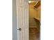 Walk-in closet featuring carpeted floor and a rod with shelves at 988 Old Holcomb Bridge Rd, Roswell, GA 30076