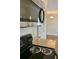 The kitchen features a stainless microwave and countertops at 988 Old Holcomb Bridge Rd, Roswell, GA 30076