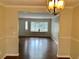 The living room features wood floors and natural light at 988 Old Holcomb Bridge Rd, Roswell, GA 30076
