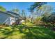 Lush backyard featuring a deck and manicured lawn at 4205 Whittier Ct, Decatur, GA 30034