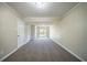 Basement with plush carpet, natural light and a door to the backyard at 4205 Whittier Ct, Decatur, GA 30034