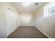 Bedroom features soft carpet, natural light and a closet at 4205 Whittier Ct, Decatur, GA 30034