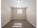 The bedroom is cozy with natural light, carpet and a closet at 4205 Whittier Ct, Decatur, GA 30034