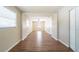 Open-concept living room features hardwood floors, neutral walls, and multiple windows, creating a bright and airy space at 4205 Whittier Ct, Decatur, GA 30034