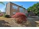 Brick house with a manicured backyard with mature trees, enhancing the landscape's appeal at 4540 Hastings Dr, Cumming, GA 30041