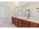 Bathroom vanity with dual sinks, lots of storage, and great lighting at 4540 Hastings Dr, Cumming, GA 30041