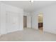 Bright bedroom with neutral carpet and closet access at 4540 Hastings Dr, Cumming, GA 30041