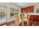 Cozy breakfast nook with natural light and wood cabinets, perfect for casual dining at 4540 Hastings Dr, Cumming, GA 30041
