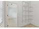 Walk-in closet with installed shelving and room to organize your wardrobe at 4540 Hastings Dr, Cumming, GA 30041