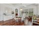 Formal dining room with hardwood floors, lots of light, and ample space for entertaining at 4540 Hastings Dr, Cumming, GA 30041