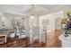 Bright dining room with hardwood floors and a stylish glass table at 4540 Hastings Dr, Cumming, GA 30041