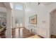 An elegant foyer featuring high ceilings, hardwood floors, and an abundance of natural light at 4540 Hastings Dr, Cumming, GA 30041