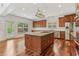 Gourmet kitchen with stainless steel appliances and a center island cooktop at 4540 Hastings Dr, Cumming, GA 30041