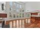 Spacious living room with fireplace and adjacent kitchen area at 4540 Hastings Dr, Cumming, GA 30041