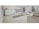 Large craft room featuring neutral carpet and lots of storage at 4540 Hastings Dr, Cumming, GA 30041