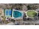 Aerial view of tennis courts, pool, community area, and landscaping at 46 Montclair Ne Dr, Atlanta, GA 30309