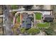 Aerial view of the home showcasing the expansive lot, driveway, and meticulously landscaped yard at 46 Montclair Ne Dr, Atlanta, GA 30309