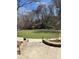 Outdoor amphitheater features a stage, lawn seating, and stone steps perfect for community events at 46 Montclair Ne Dr, Atlanta, GA 30309