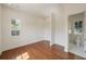 Bedroom with hardwood floors, bright walls, bathroom, and one window at 46 Montclair Ne Dr, Atlanta, GA 30309