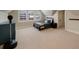 Spacious bedroom with a bed, large windows with shutters, and neutral-toned carpet flooring at 46 Montclair Ne Dr, Atlanta, GA 30309