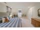 Bedroom featuring built-in bookshelves, a comfortable armchair, and natural light from a skylight at 46 Montclair Ne Dr, Atlanta, GA 30309
