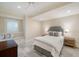Cozy bedroom with a comfortable bed, window seat, and stylish decor at 46 Montclair Ne Dr, Atlanta, GA 30309