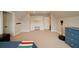 Spacious bonus room with a desk, built-in shelves, and neutral-toned carpet flooring at 46 Montclair Ne Dr, Atlanta, GA 30309