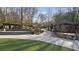 Community green space with a gazebo, stone seating area, and pathway for relaxation and socializing at 46 Montclair Ne Dr, Atlanta, GA 30309