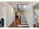 Elegant hallway features hardwood flooring and staircase leading to the upper level at 46 Montclair Ne Dr, Atlanta, GA 30309