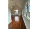 Large living room with wooden floors, many windows, and bright walls at 46 Montclair Ne Dr, Atlanta, GA 30309