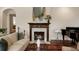 Comfortable living room with a fireplace, classic decor, and hardwood floors at 46 Montclair Ne Dr, Atlanta, GA 30309