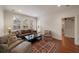 Cozy living room with hardwood floors, large windows, and comfortable seating at 46 Montclair Ne Dr, Atlanta, GA 30309