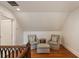 Comfortable sitting area with cozy chairs, an ottoman, and hardwood floors at 46 Montclair Ne Dr, Atlanta, GA 30309
