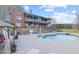 A beautiful backyard features a brick home with a large pool and plenty of space for outdoor relaxation and entertaining at 5168 Parkview Rd, Social Circle, GA 30025