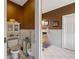 Unique bathroom with a separate toilet room, complemented by stylish fixtures and finishes at 5168 Parkview Rd, Social Circle, GA 30025
