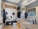 Bathroom with grey walls, granite vanity, and a shower with a Panda bear shower curtain at 5168 Parkview Rd, Social Circle, GA 30025