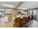 Spacious kitchen features an island with seating, tile floors, stainless steel appliances and tile backsplash at 5168 Parkview Rd, Social Circle, GA 30025