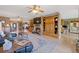 The living room boasts a fireplace, large built-ins, and a view to the dining area and front entryway at 5168 Parkview Rd, Social Circle, GA 30025