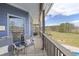 Inviting outdoor porch with seating, featuring scenic views and a relaxing atmosphere at 5168 Parkview Rd, Social Circle, GA 30025