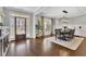 Elegant dining room with hardwood floors, modern lighting, and stylish decor at 812 Newsome Nw Aly, Marietta, GA 30064