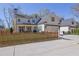 Beautiful two-story home with a picket fence and well-maintained yard at 812 Newsome Nw Aly, Marietta, GA 30064