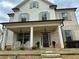 Charming two-story home with a brick facade and covered front porch at 812 Newsome Nw Aly, Marietta, GA 30064