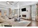 Bright living room with a fireplace, comfortable seating, and decorative curtains at 812 Newsome Nw Aly, Marietta, GA 30064