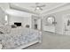 Elegant bedroom with sitting area, gray carpet, and a tray ceiling at 812 Newsome Nw Aly, Marietta, GA 30064